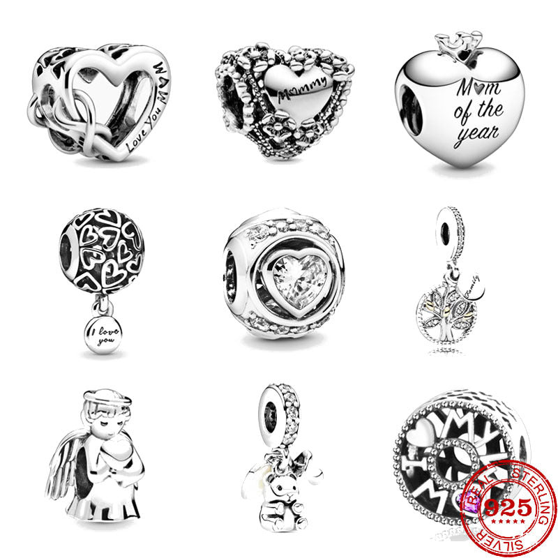 New Additions: Sterling silver charms featuring heart designs, angel motifs, and intricate detailing, perfect for personalized jewelry.