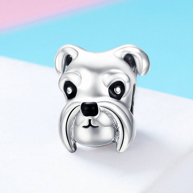 Close-up of Schnauzer charm in sterling silver, highlighting its intricate design and polished surface.