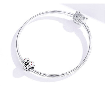 Engagement charm on silver bracelet