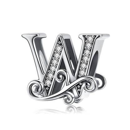 Elegant letter W charm with ornate details