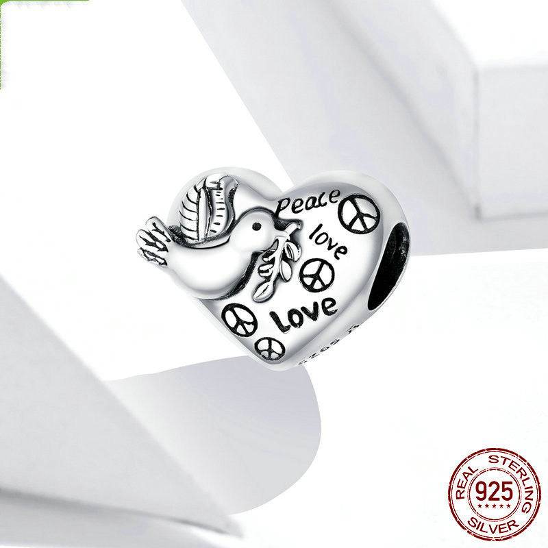 Heart-shaped Peace Dove Charm with love symbols