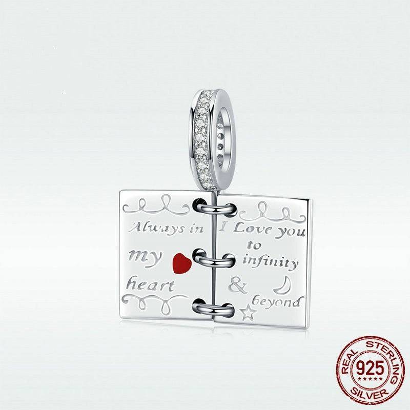 Sterling silver love notes charm with 'I love you to infinity' engraving.