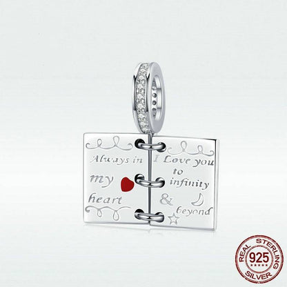 Sterling silver love notes charm with 'I love you to infinity' engraving.