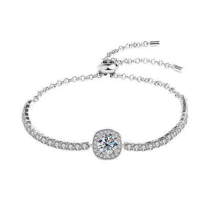 Silver moissanite galaxy bracelet with a clear central stone and adjustable chain, featuring a celestial-inspired design.