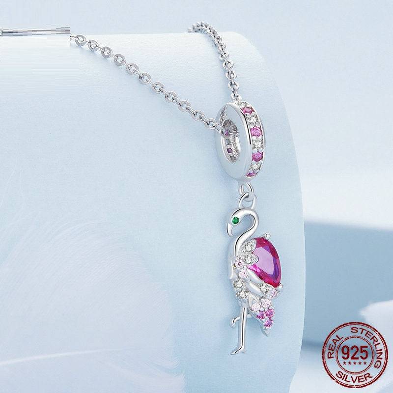 Flamingo charm on silver necklace