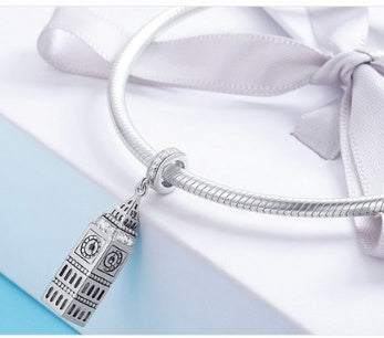 Big Ben Charm elegantly displayed on a silver bracelet, making a stylish and cultural jewelry statement.