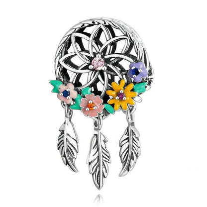 Dreamcatcher charm with floral accents