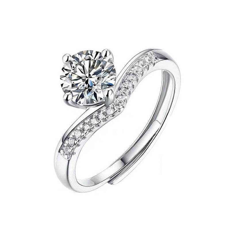 Princess Crown Silver Moissanite Ring with a 1 carat sparkling stone and adjustable fit. Elegant design with embedded smaller stones on a silver band.