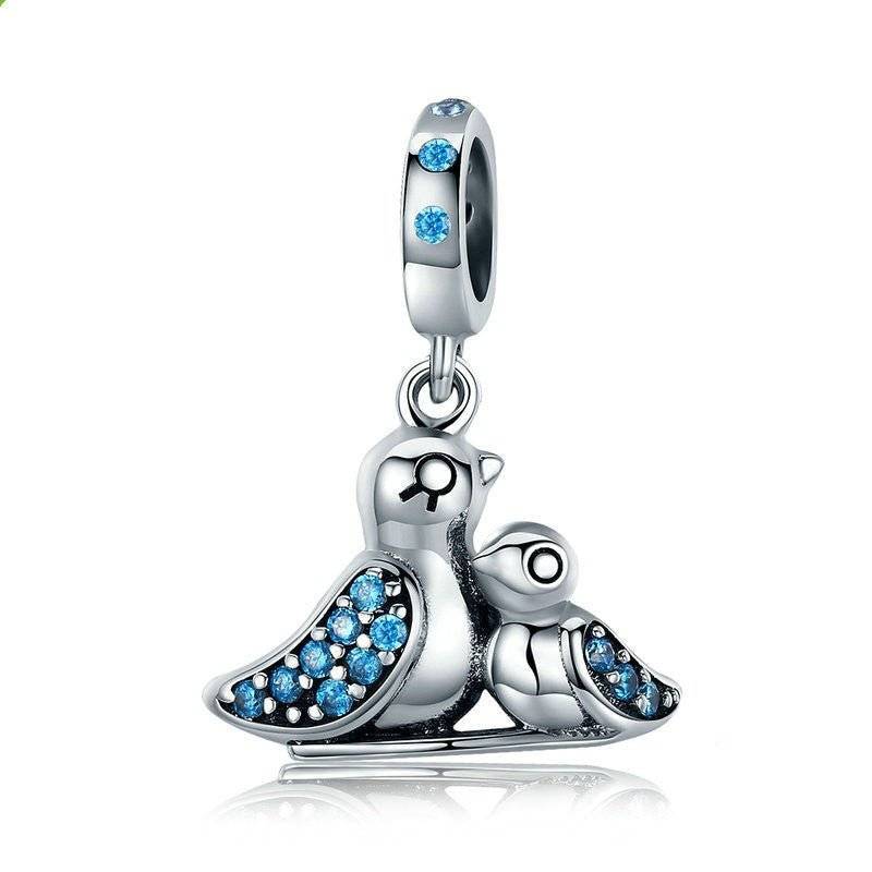 Sterling silver bird charm with blue crystals