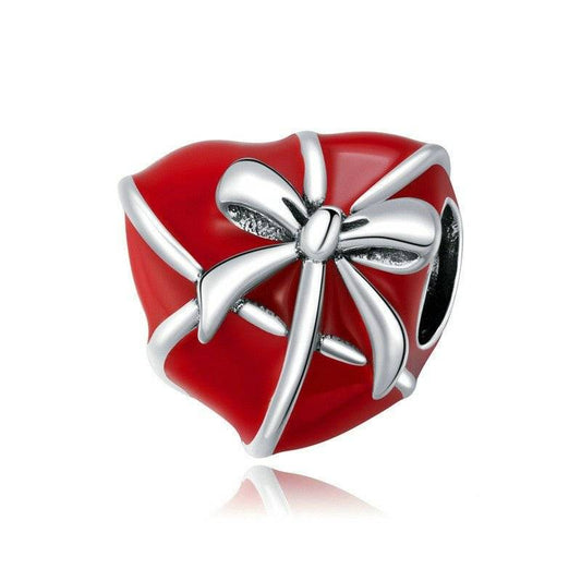 Red heart charm with silver bow detail