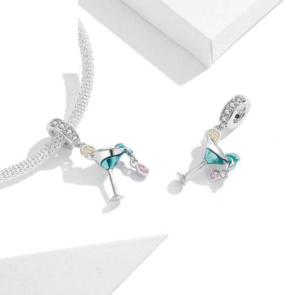 Pair of cocktail glass charms with vibrant details