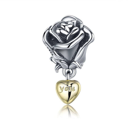 Rose charm with gold heart pendant